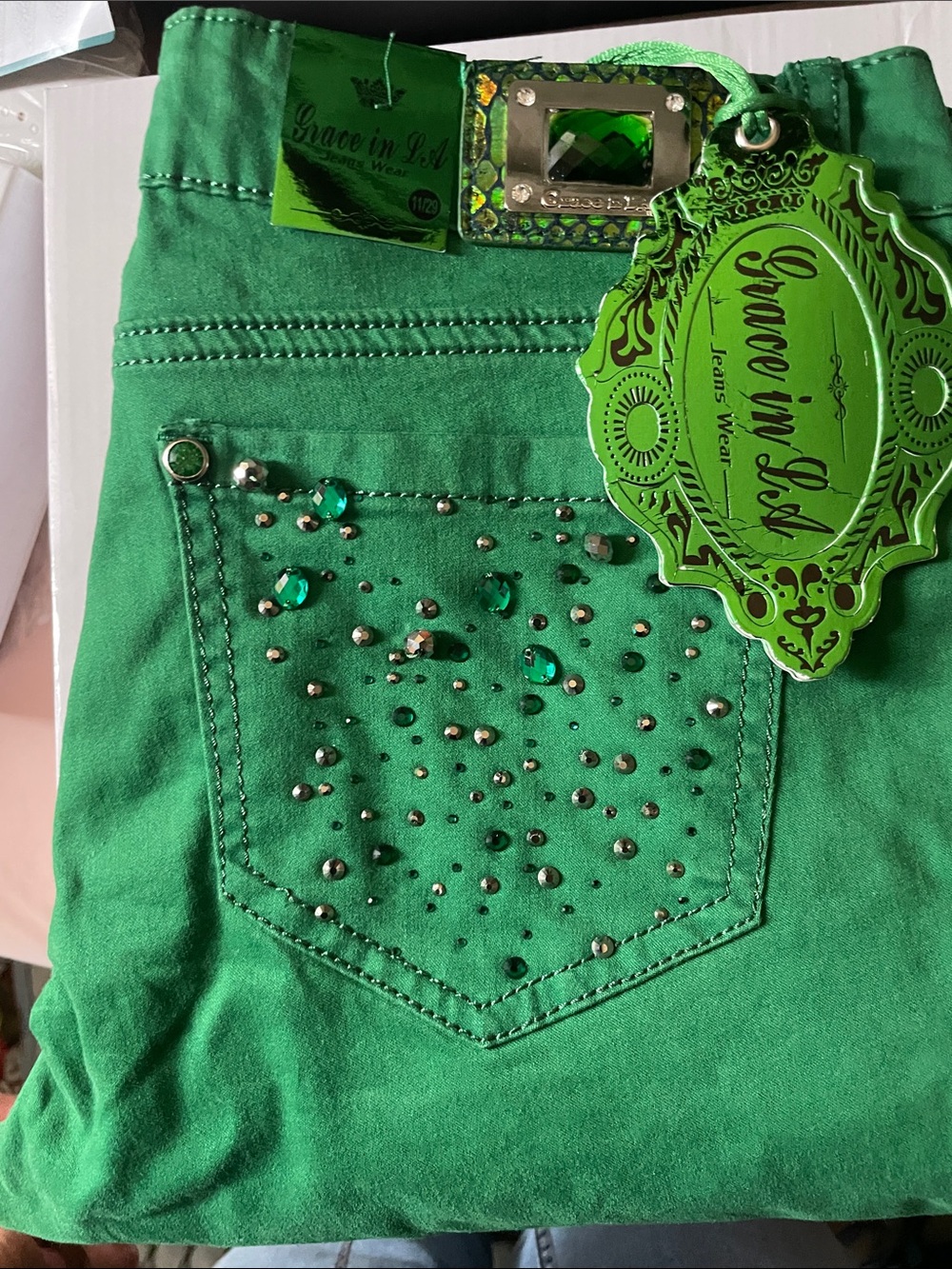 Gorgeous jeans with rhinestones of emerald greens and silver speckles